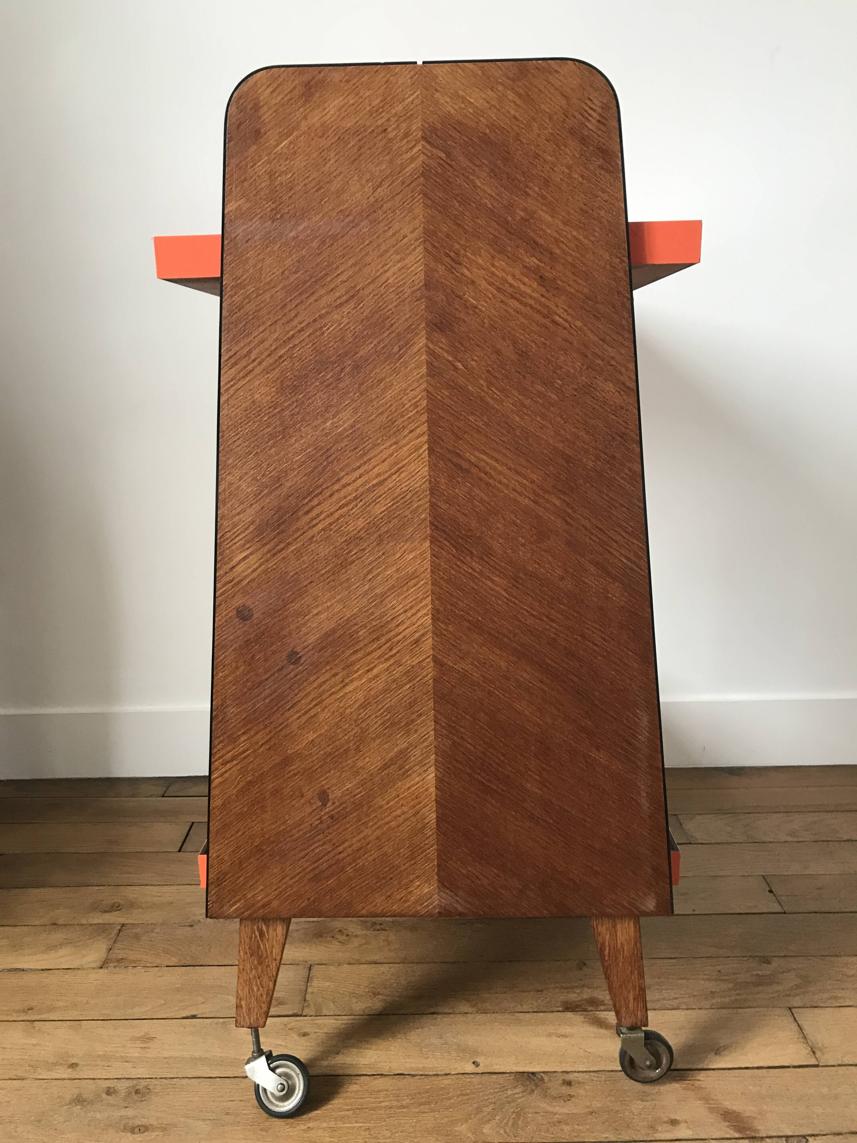 Desserte vintage orange, pieds en équerre et montants bois, années 60