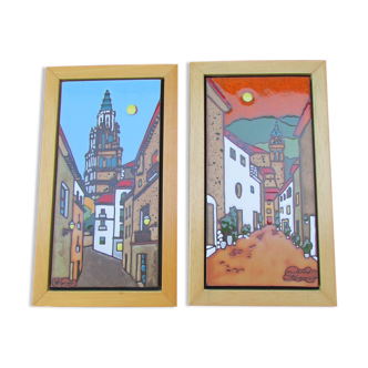 Framed enamelled faience, lot of two