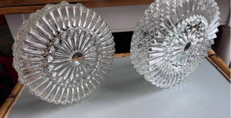 Pair of round vintage moulded glass ceiling lights.