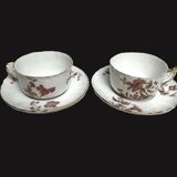 Two English porcelain teacups with floral decoration, 19th century