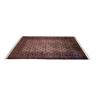 Old handmade wool Persian rug