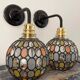Pair of vintage faceted glass wall lamps