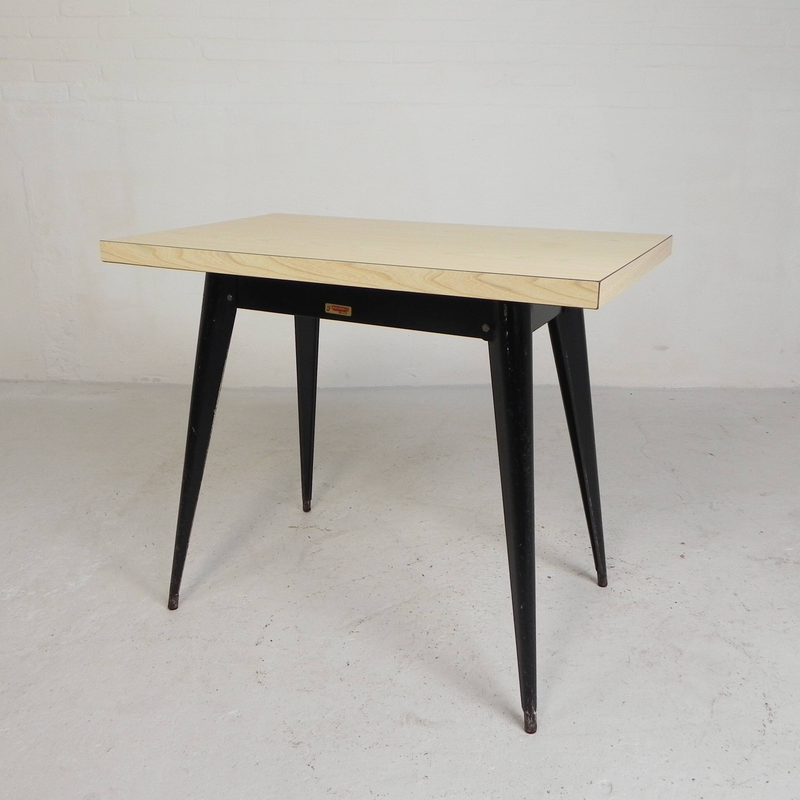 Bistro table Henri Julien, model Tolix T55 with a Formica top, 1950s.