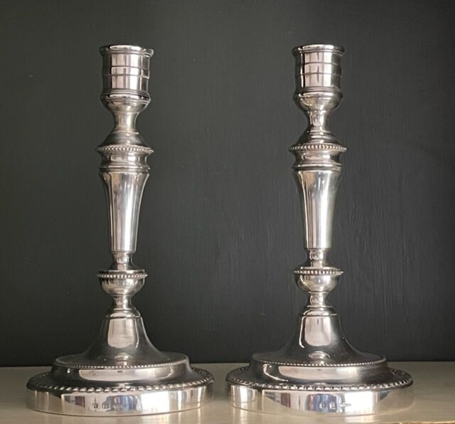 Pair of Christofle silver metal candle holders.