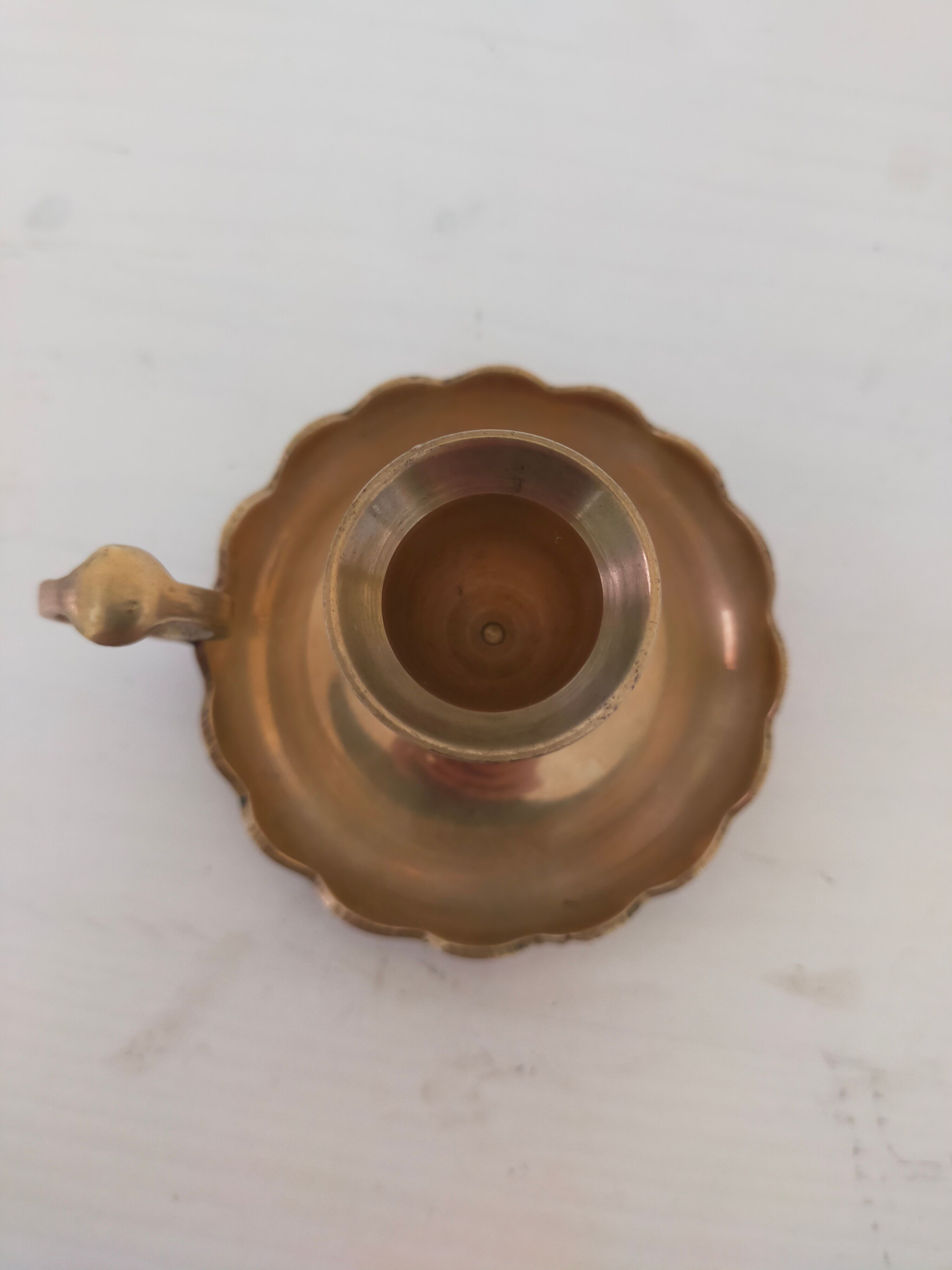 Brass handheld candle holder
