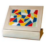 White wooden boxes decorated with Catalan trencadís style mosaics