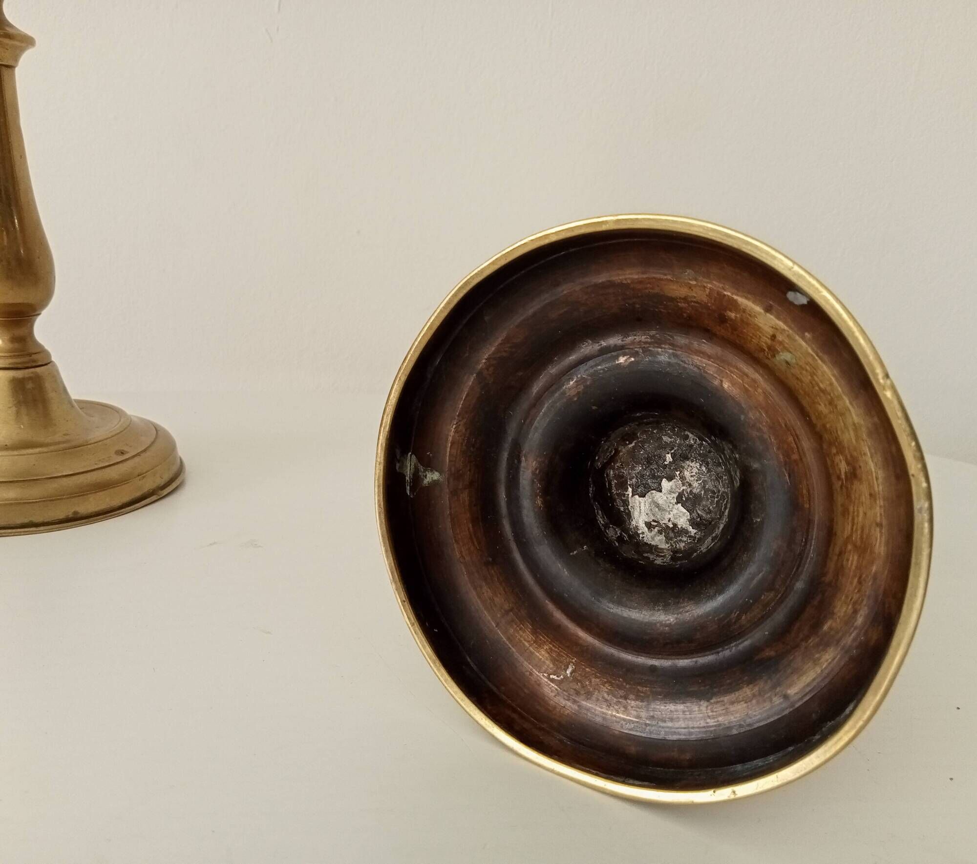 Pair of old candlesticks in solid gilded brass