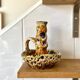 Enamelled ceramic candle holder