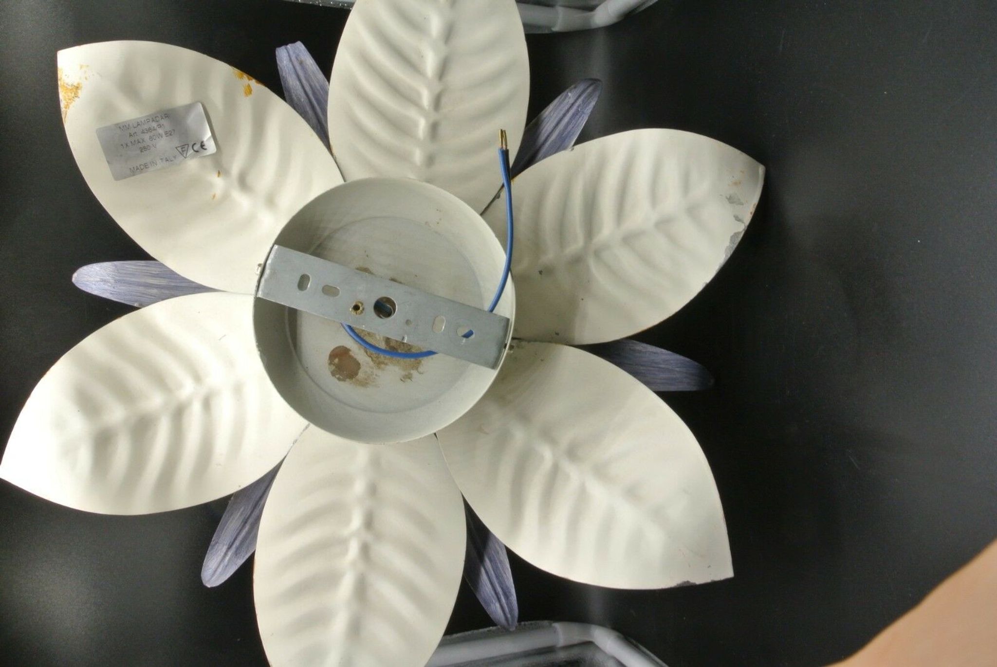 Silver-coloured metal flower shape wall sconce