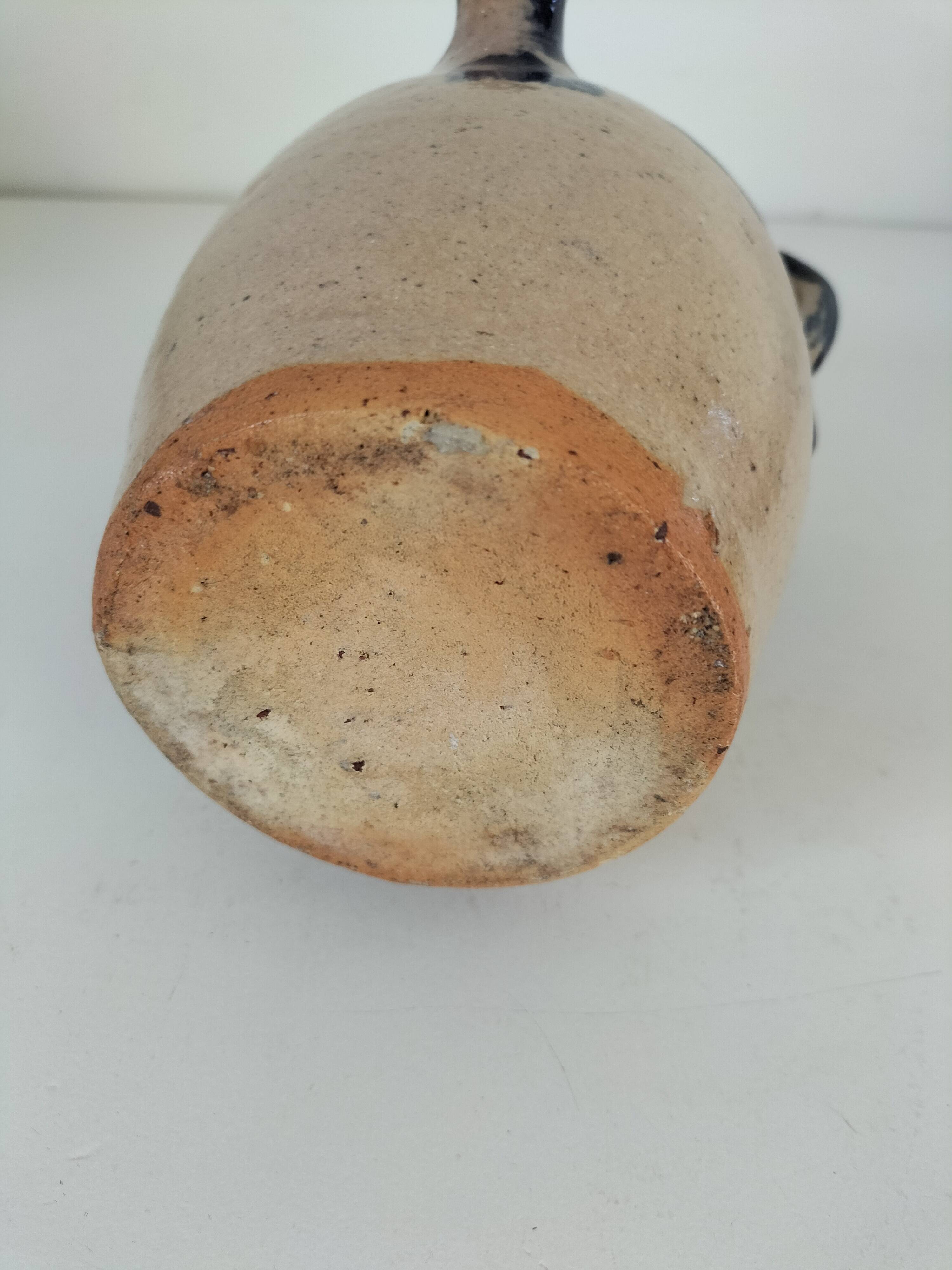 Old pitcher (goat) in cobalt glazed earthenware