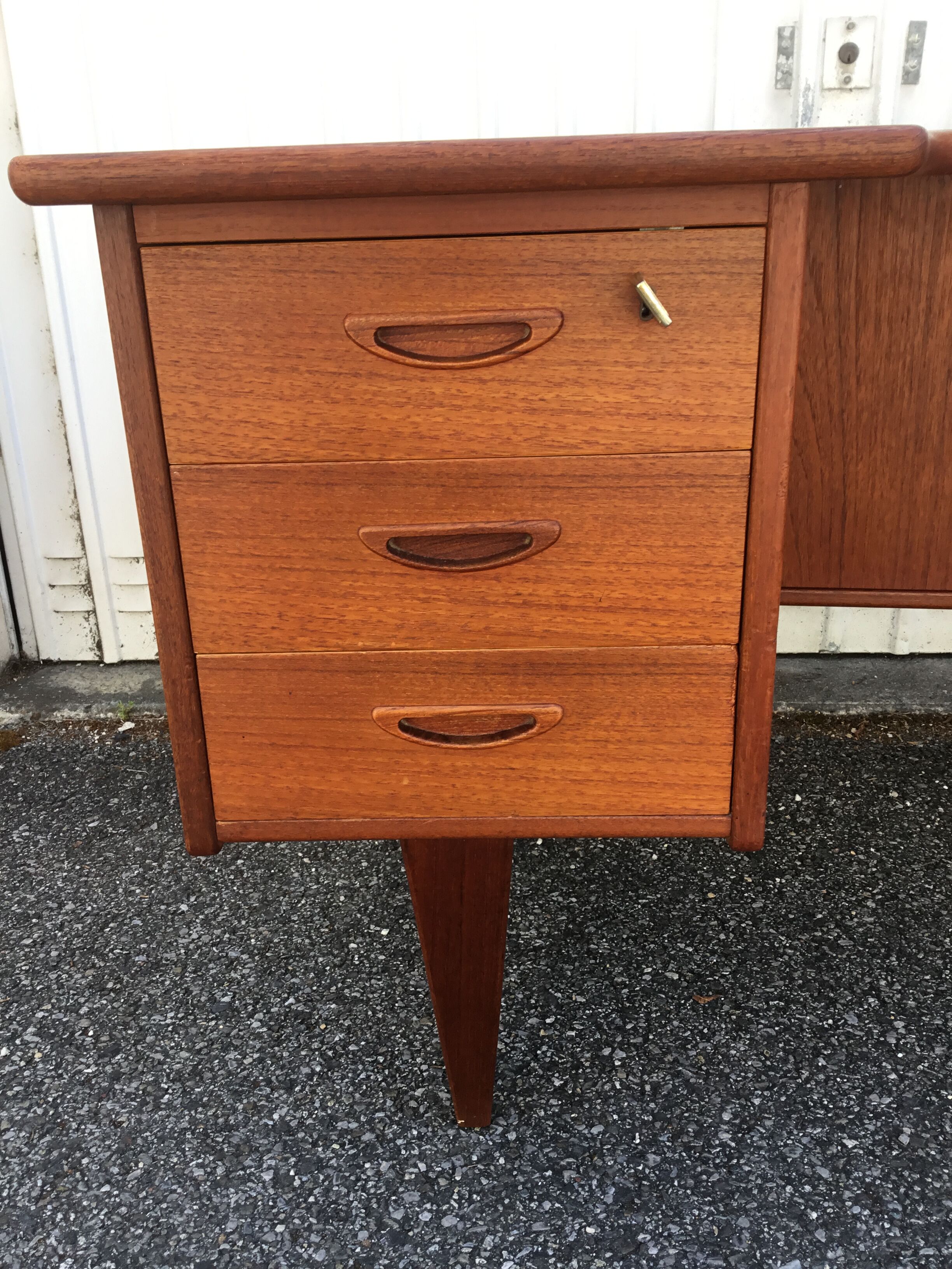 Peter Lovig Nielsen's Scandinavian teak boomerang desk from the 60s