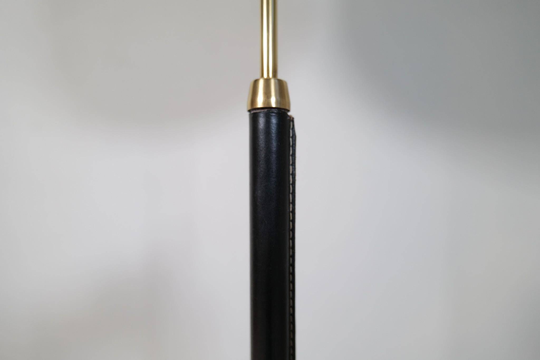 Mid-century black leather and brass floor lamp by Falkenbergs Belysning, Sweden, 1960s.
