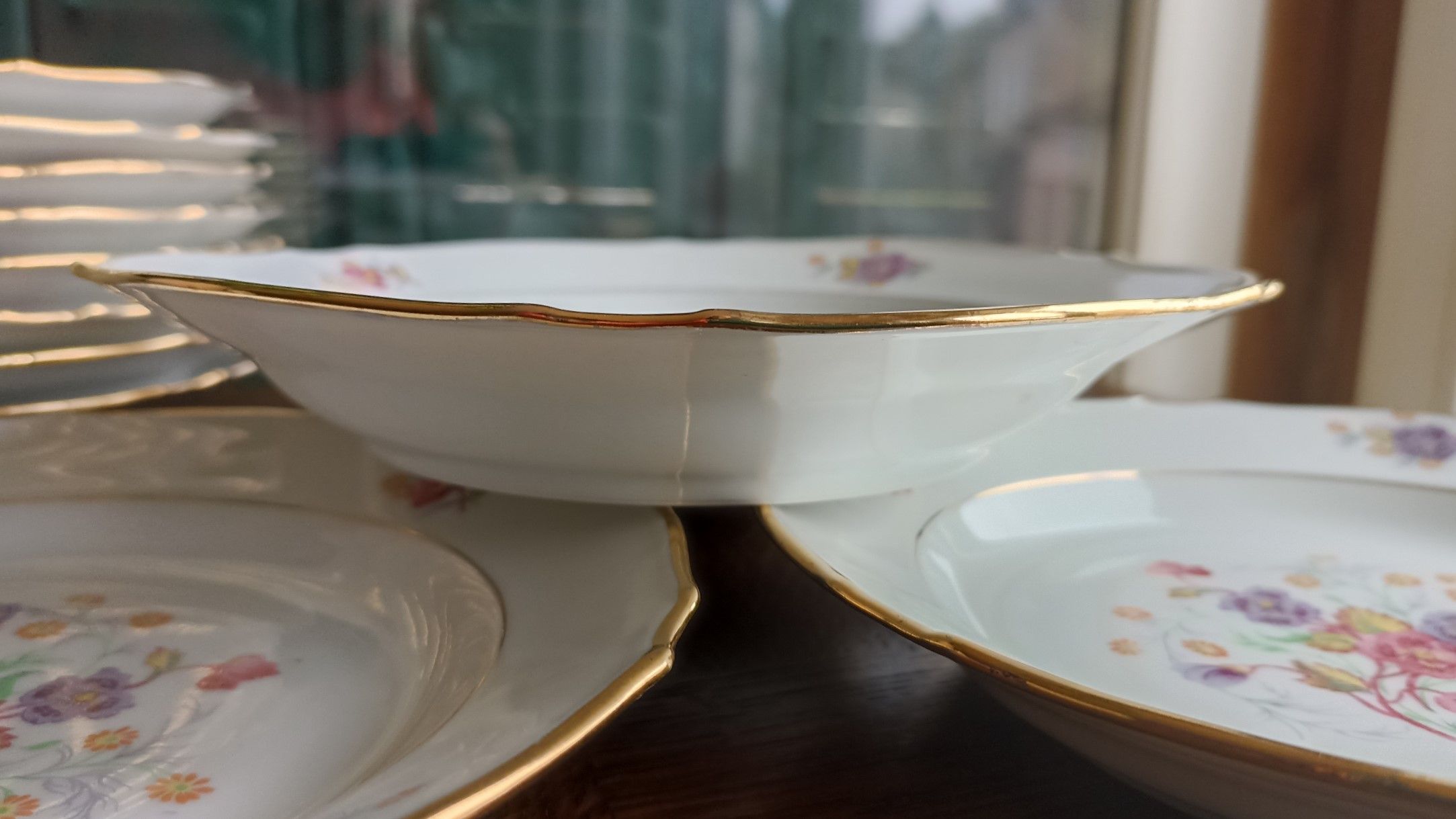 12 semi-hollow plates in Vierzon porcelain decorated with flowers and gilding