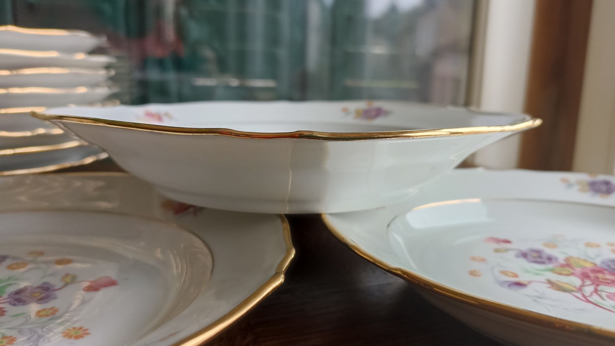12 semi-hollow plates in Vierzon porcelain decorated with flowers and gilding