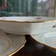 12 semi-hollow plates in Vierzon porcelain decorated with flowers and gilding