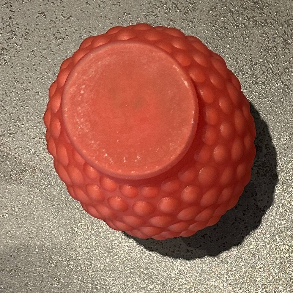 Small Art Deco ball vase in red-orange tinted glass