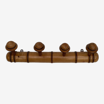 Wall coat rack with four wooden hooks Dimension: width -51.5 cm- height -6cm-