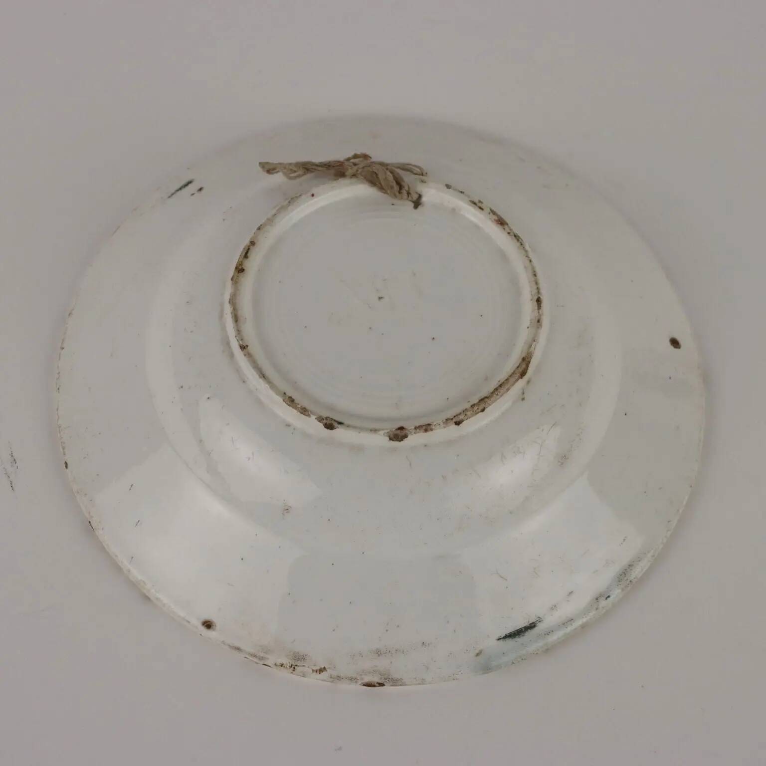 Antique ceramic plate made in France, early 20th century.