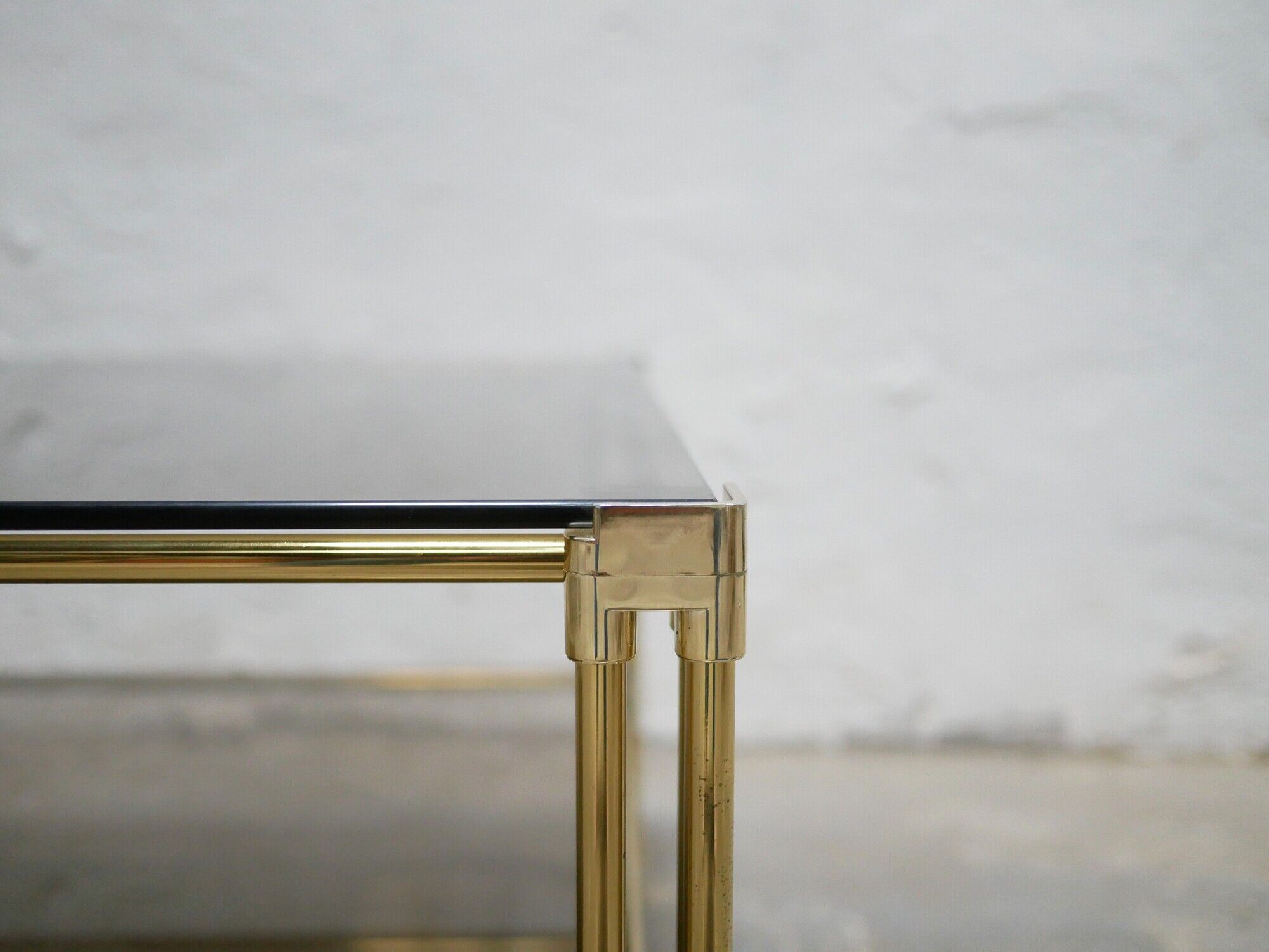 Table basse vintage en verre et laiton éditée par Roche Bobois