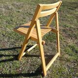 Pair of vintage folding chairs in light wood