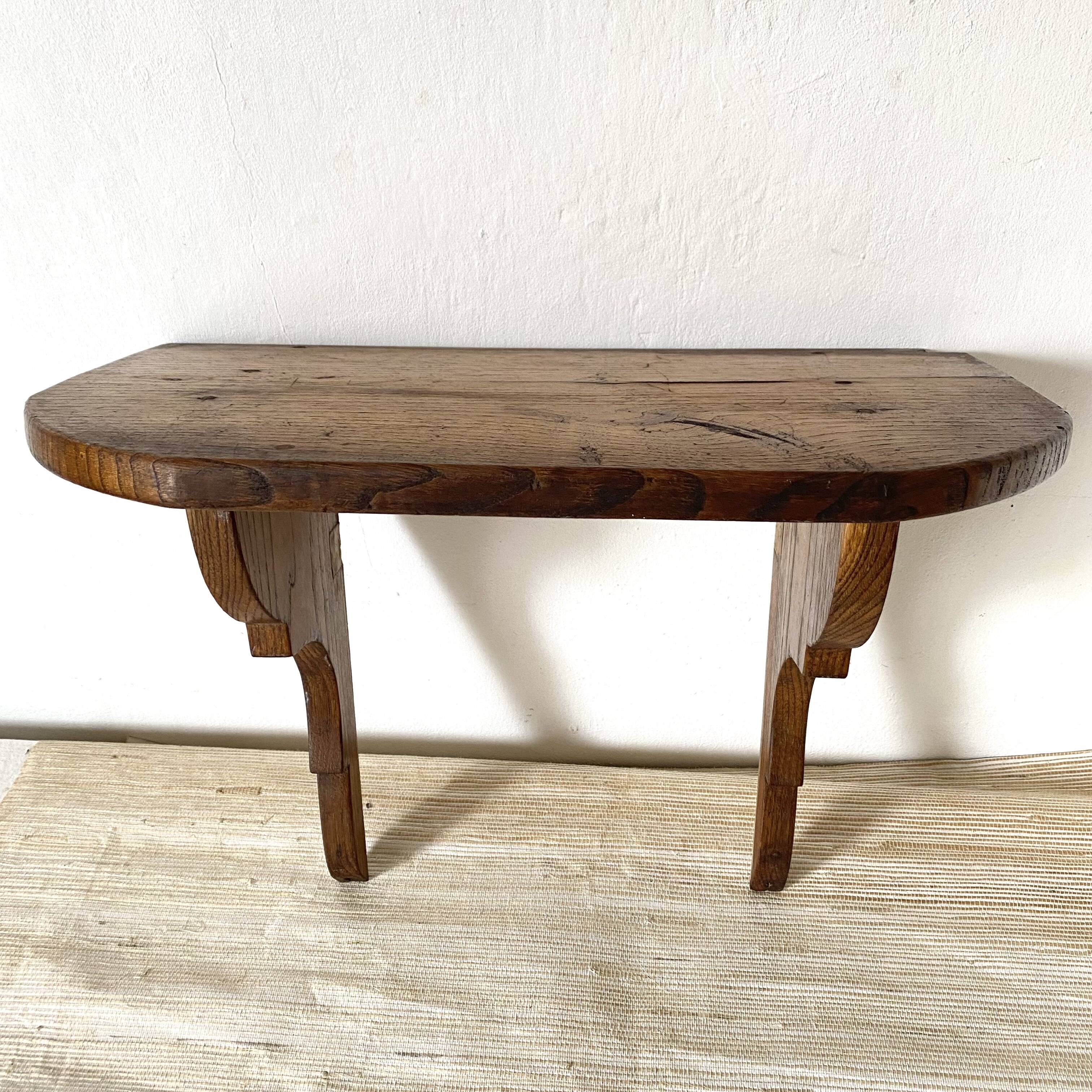 Rustic wooden wall shelf