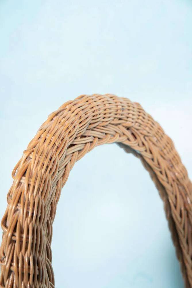 Vintage 70s bohemian wall mirror in woven rattan.