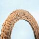Vintage 70s bohemian wall mirror in woven rattan.