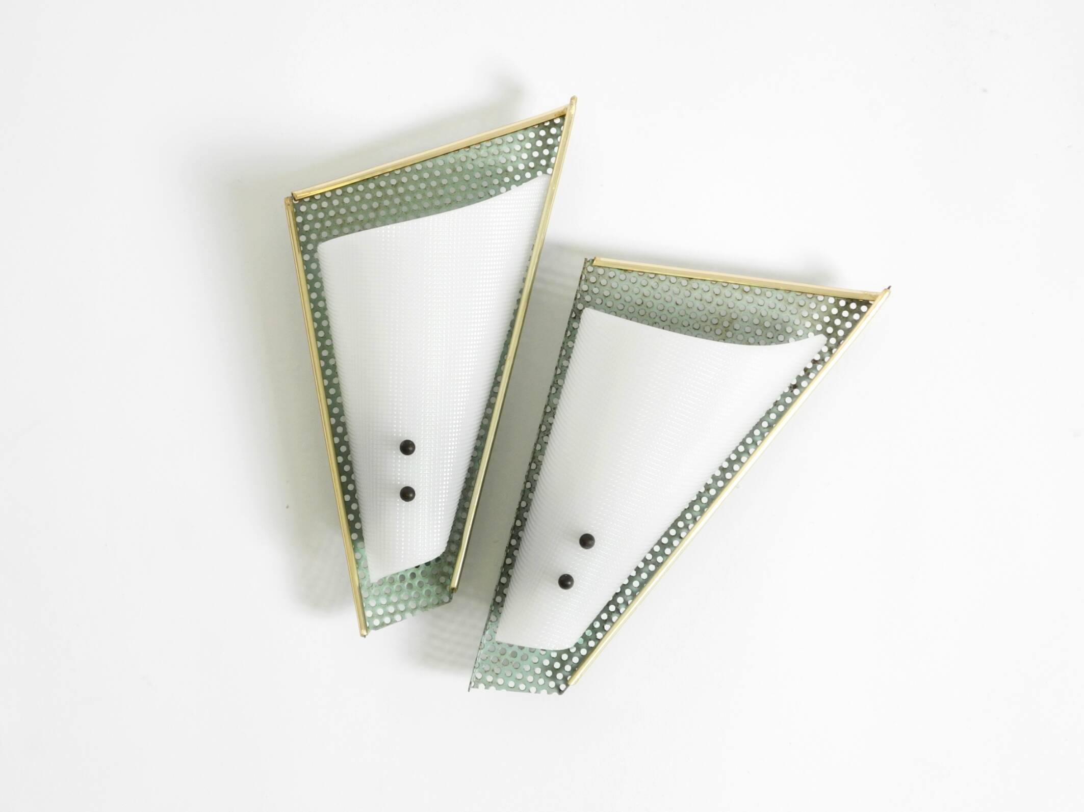 Pair of beautiful mint green Mid Century Modern perforated sheet metal wall