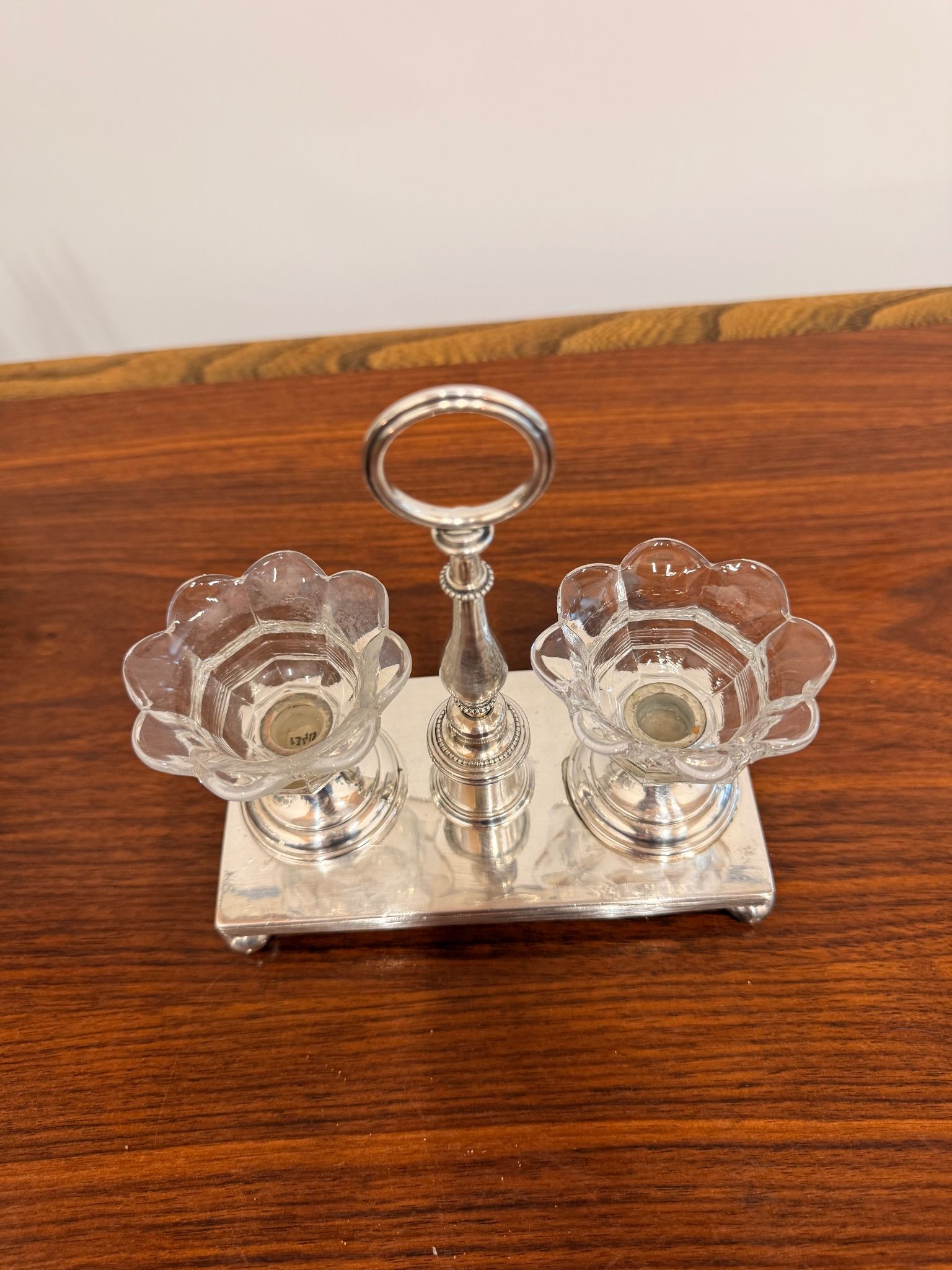 Vintage silver-plated salt and pepper shaker set in crystal.