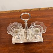 Vintage silver-plated salt and pepper shaker set in crystal.