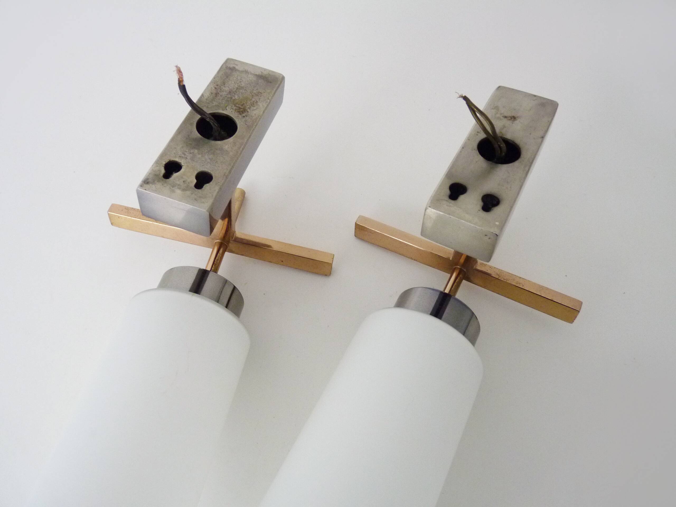 Pair of chrome-plated metal and opaline brass wall lights. 1960s