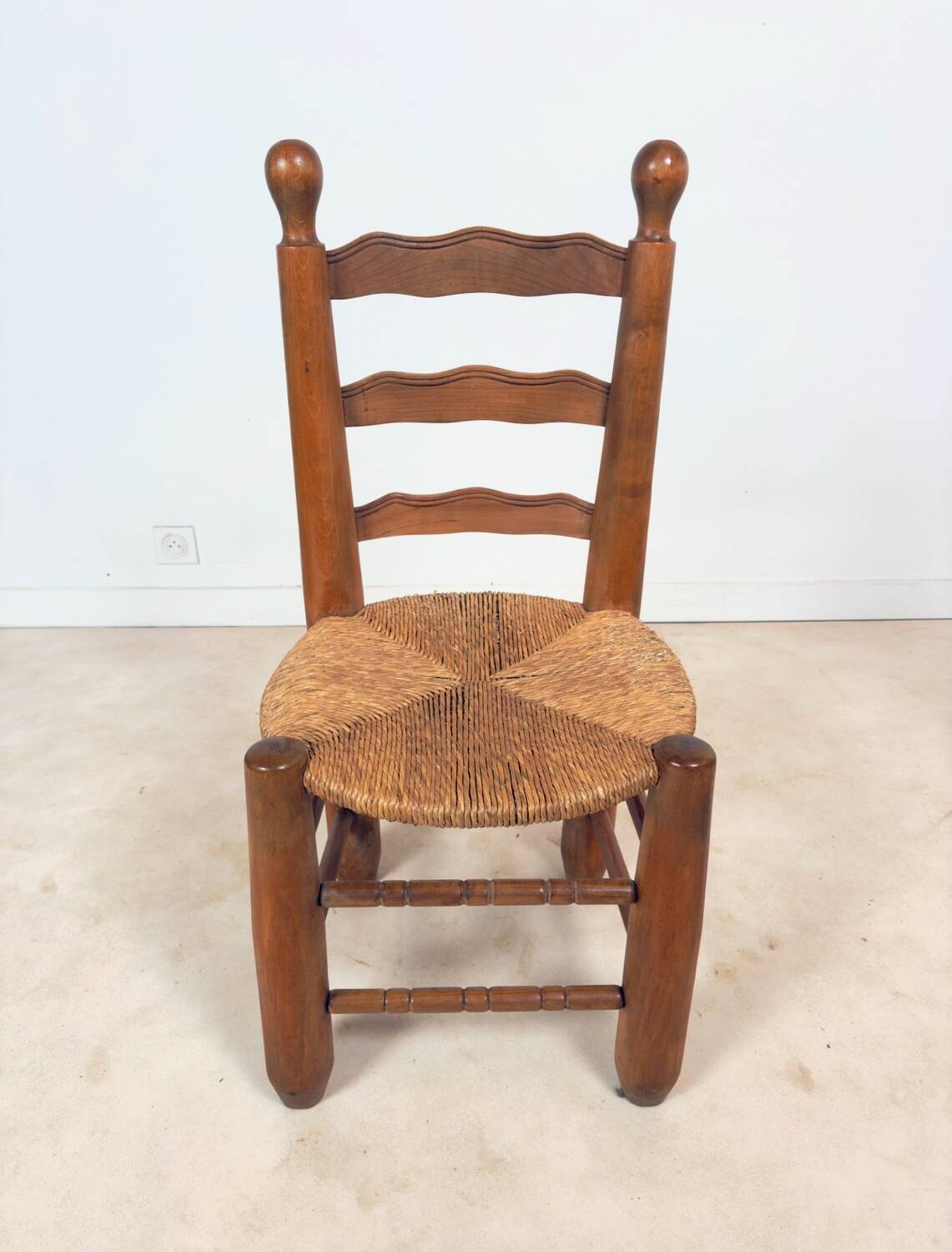Vintage wooden chair with rush seating