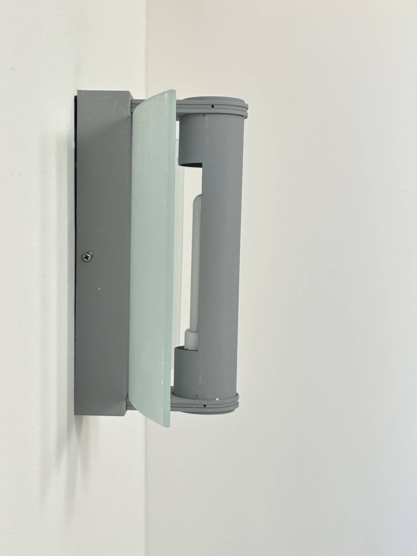 Vintage wall light, grey lacquered metal and frosted curved glass, France, 1980.