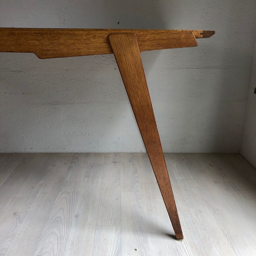 Dining table by Gérard Guermonprez by Magnani (1957)