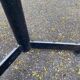 Round bistro table with a central pedestal, gold marble effect and black steel, 60cm.