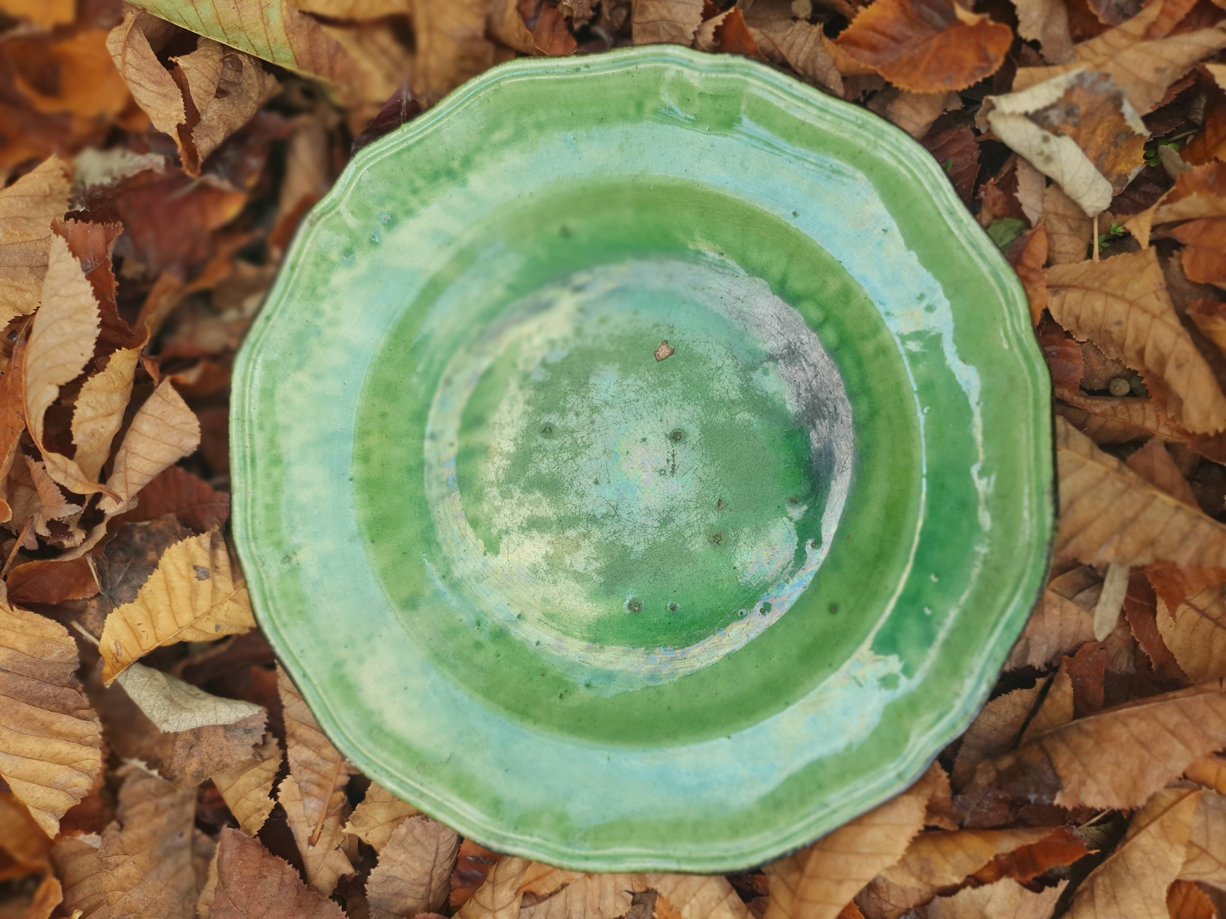 Hollow plate in green glazed clay Etienne Noël