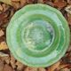 Hollow plate in green glazed clay Etienne Noël