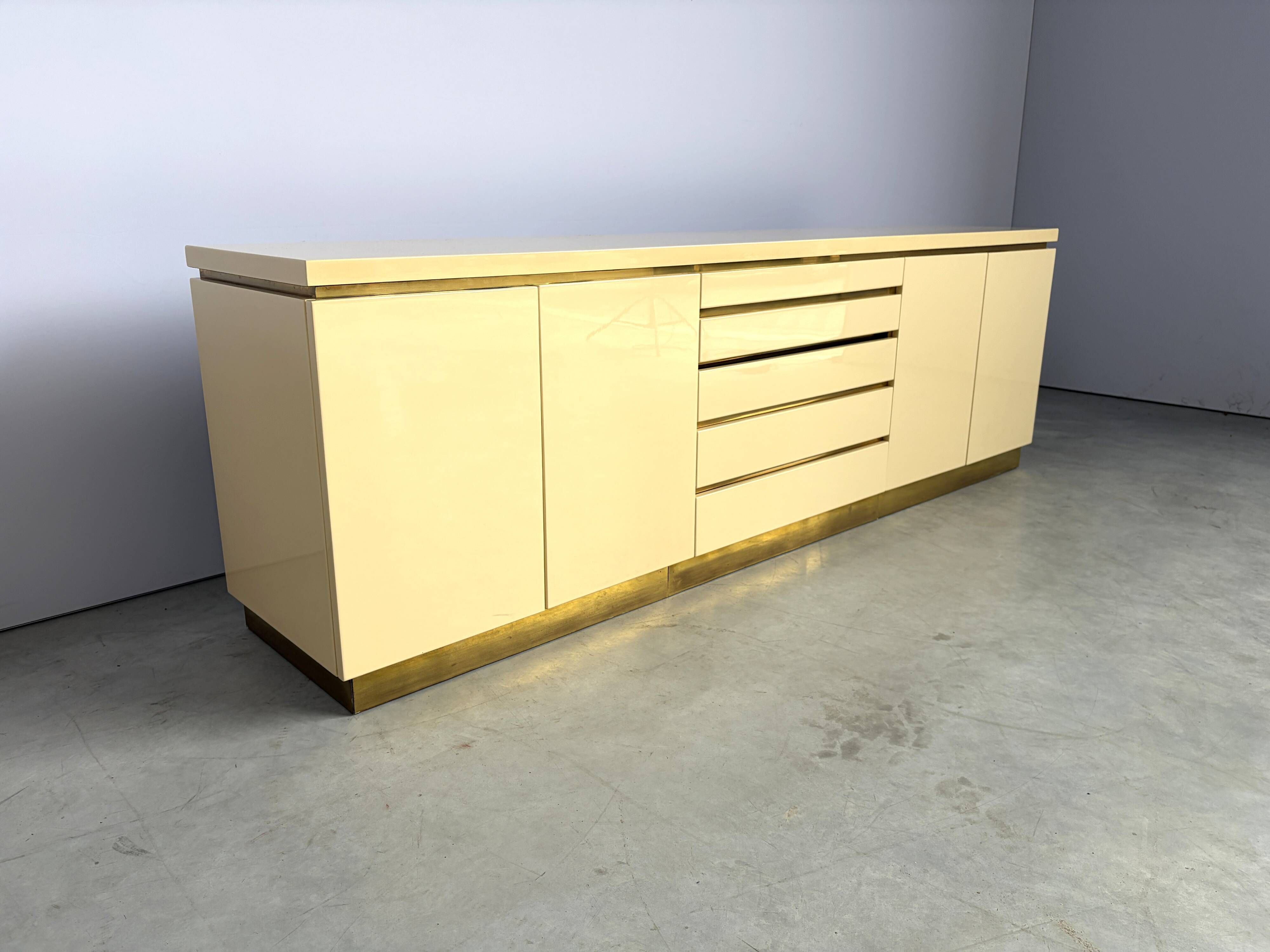 Brass and lacquer credenza by Jean Claude Mahey, 1970s
