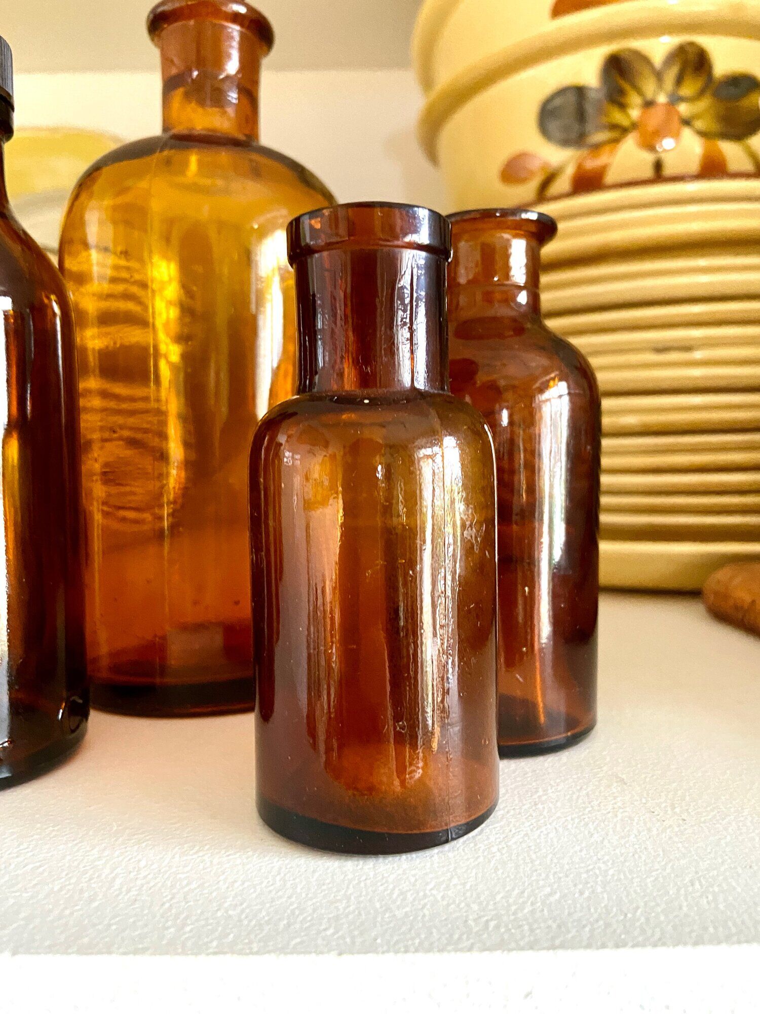 8 amber glass apothecary bottles