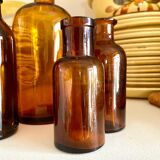 8 amber glass apothecary bottles
