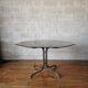 Table de salle à manger piètement chromé et plateau verre fumé circa 1970.