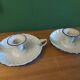 Pair of enamelled candle holders