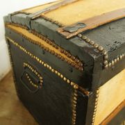 Old-curved wooden trunk - burlap