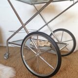 Rolling dessert / chrome bar and smoked glass