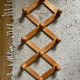 Vintage accordion wall coat rack
