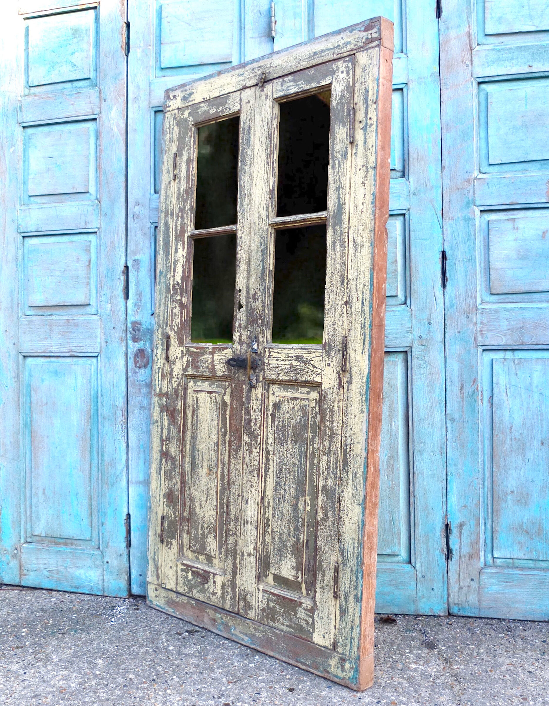 A Gorgeous Pair of Large Yellow Antique Shutter Doors
