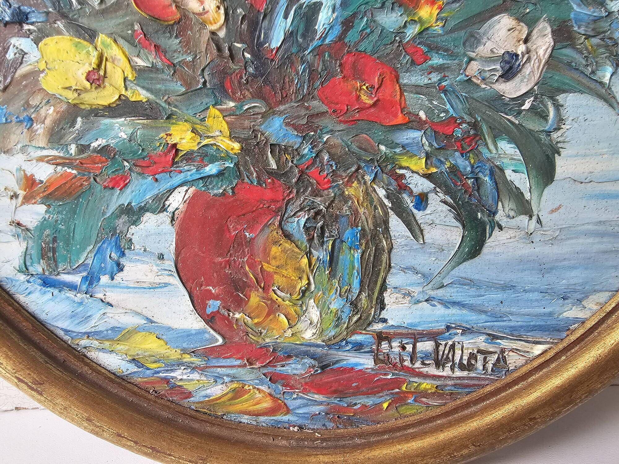 Oil painting on panel of a bouquet of colourful flowers in a vase, signed Valota.