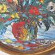 Oil painting on panel of a bouquet of colourful flowers in a vase, signed Valota.
