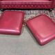 Chesterfield 2-seater leather sofa, modern production from the 2000s.