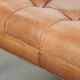 Sheepskin ottoman/coffee table on wheels in English chesterfield style